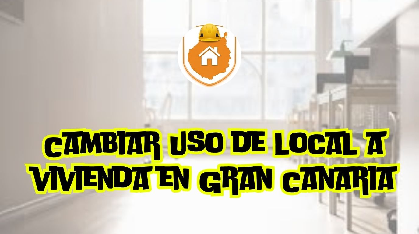 Un arquitecto técnico revisando unos planos de distribución sobre el mostrador de un antiguo local comercial en Gran Canaria.